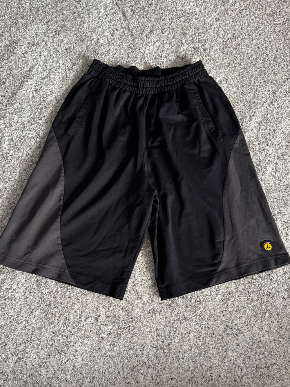 Jordan Black Athletic Shorts with Dark Gray Panels and Yellow Logo